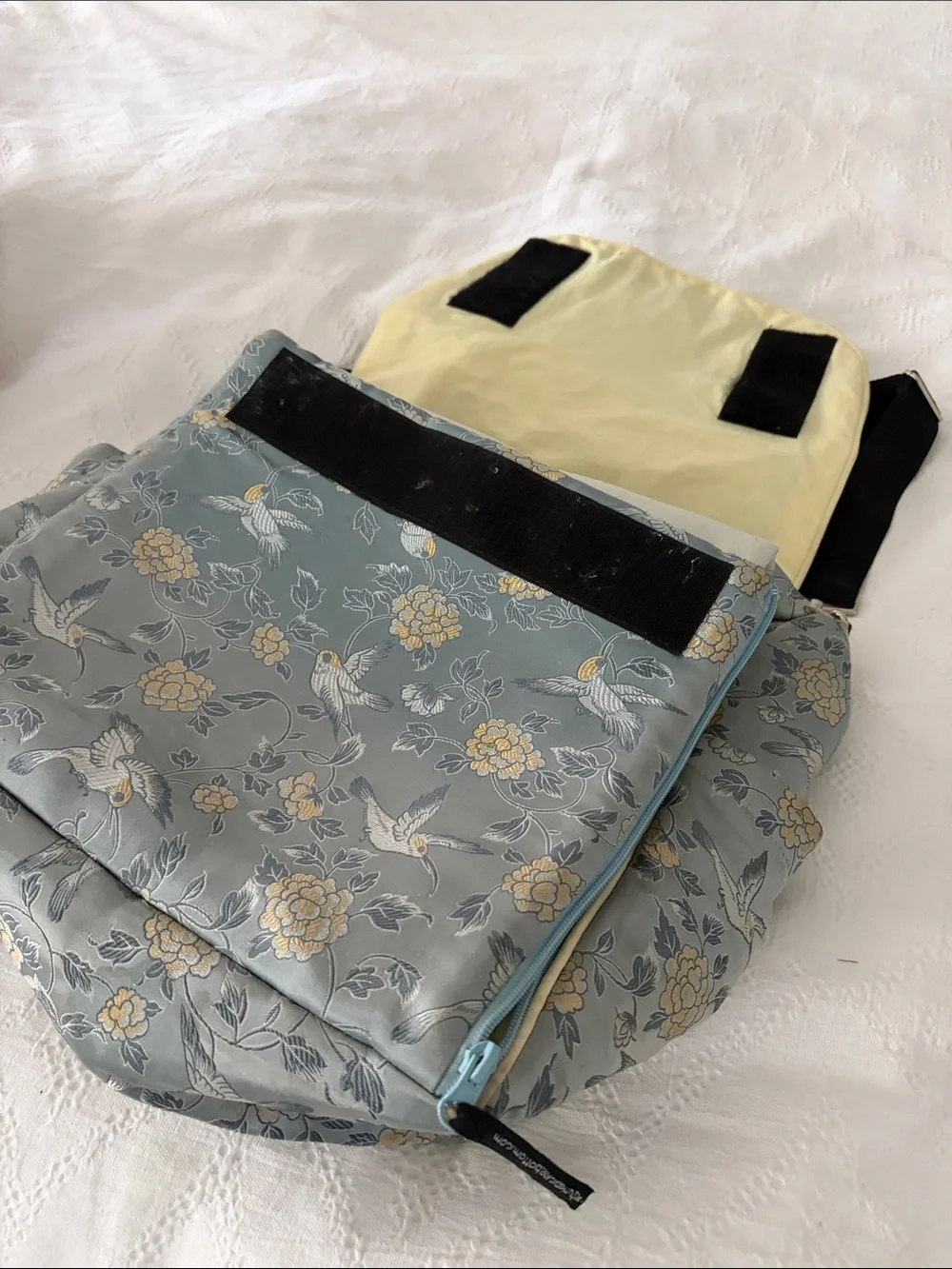 Petunia Pickle Bottom Blue Floral Crossbody Baby Bag with Black Strap